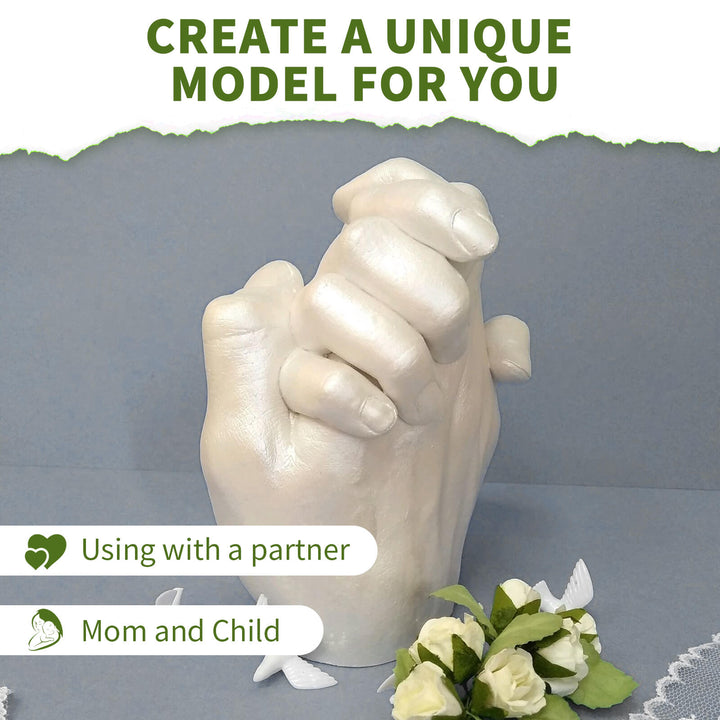 White hand mold with baby hand and flowers on a gray background, with text promoting a unique model. Create 3D Hand & Foot Models with EELHOE Powder EELHOE Couple Hand Model Replication Powder for Creating 3D Hand and Foot Models for Babies and Children, Ideal for a Valentine's Day Present